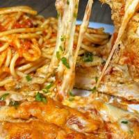 Chicken Parmesan Dinner · Breaded chicken or eggplant topped with sauce, mozzarella and parmesan cheese served with ro...