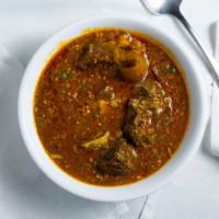 Okra Ladies Fingers · Chopped okra cooked in palm oil with chopped green leaves and assorted meats. Serve with you...