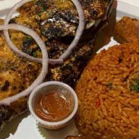 Jollof Rice With Fish · Jollof rice with Grilled or Fried Tilapia