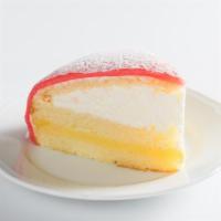 Principessa · lemon sponge layered between vanilla pastry cream and whipped cream, topped with almond marz...