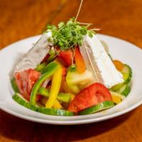 Heirloom Tomatoes · Gluten free. Authentic Greek salad, organic tomatoes, cucumbers, onions, peppers, organic fe...