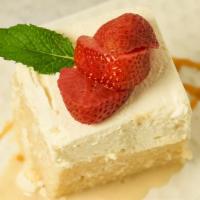 Tres Leche Cake · Buttery sponge cake drenched in a sweet milk mixture.