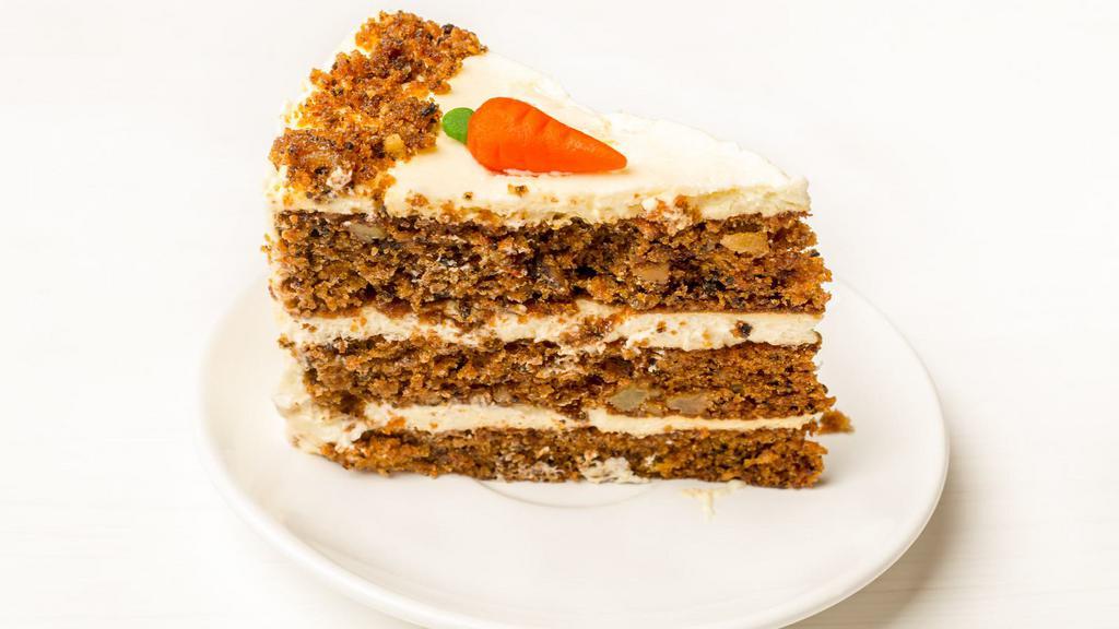 Carrot Cake · Perfectly spiced moist carrot cake with a rich, cream cheese frosting.