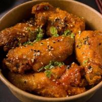 Chicken Wings · Soy garlic or hot and spicy gochujang chili.