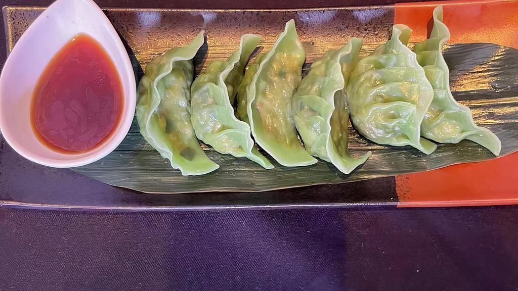 Pan Fried Vegetable Dumpling · served with 7pc