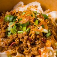 Spicy Sesame Dandan Noodles · Sichuan-style spicy noodles with minced pork and scallion.