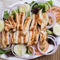 House Grilled Chicken Salad · Marinated breast chicken cooked in a charbroiler grill with romaine lettuce, tomato, spinach...