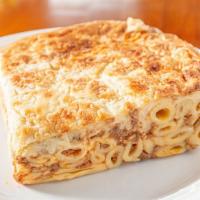Pastitsio · Pa-sti-tsio. Layers of pasta and chopped meat covered with a creamy bechamel sauce.