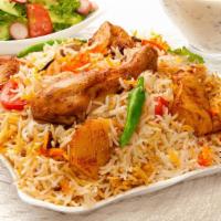 Tc'S Special Chicken Biryani · Spicy basmati rice cooked in biryani spices herbs and juicy chicken leg pieces.