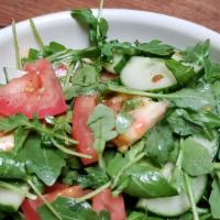 Side Salad (V) · Arugula, tomato, and cucumber.