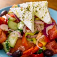 Horiatiki · Greek salad with tomatoes,cucumbers, peppers, red onion, olives, feta, red vine and olive oi...