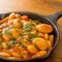 Gigantes · Braised giant beans, vegetables, tomatoes, herbs and virgin olive oil