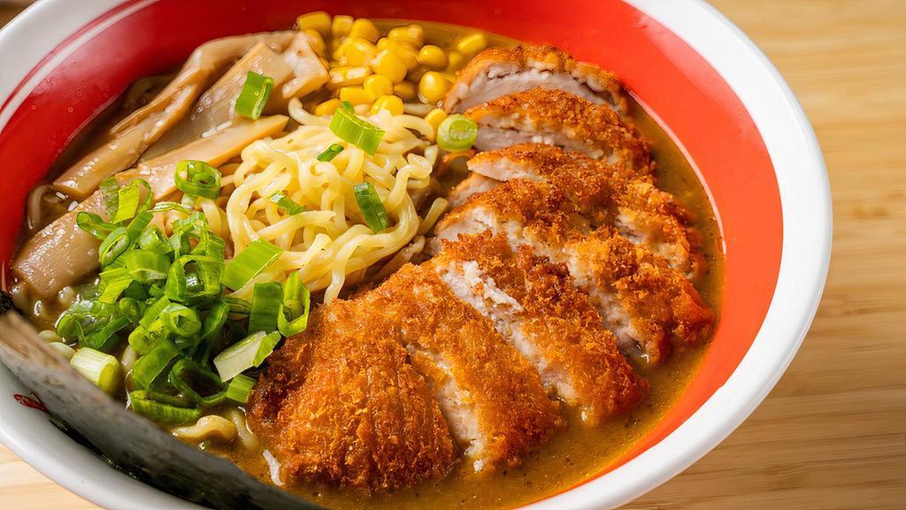 #7B Tonkatsu Curry Ramen · Pork cutlet (tonkatsu) with bamboo shoots, corn, shredded hot pepper, seaweeds, half soft-boiled marinated egg and scallions, bland along with strong curry tonkotsu pork soup base.