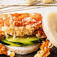 Soft Shell Crab Rice Burger · Soft shell crab, cucumber, pickled carrots, mayo.