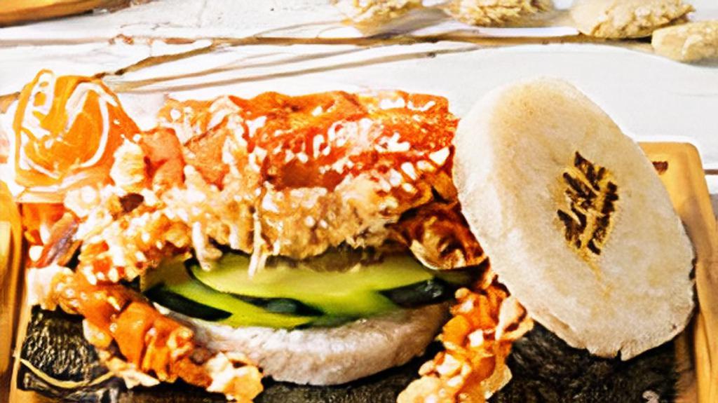 Soft Shell Crab Rice Burger · Soft shell crab, cucumber, pickled carrots, mayo.