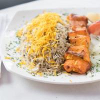 Salmon · Char-broiled chunks of salmon marinated in our special recipe served with dill rice.