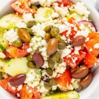 Greek Salad · Greek salad, tomatoes, onions, feta cheese, cucumbers, pepper, olives, capers, olive oil & v...