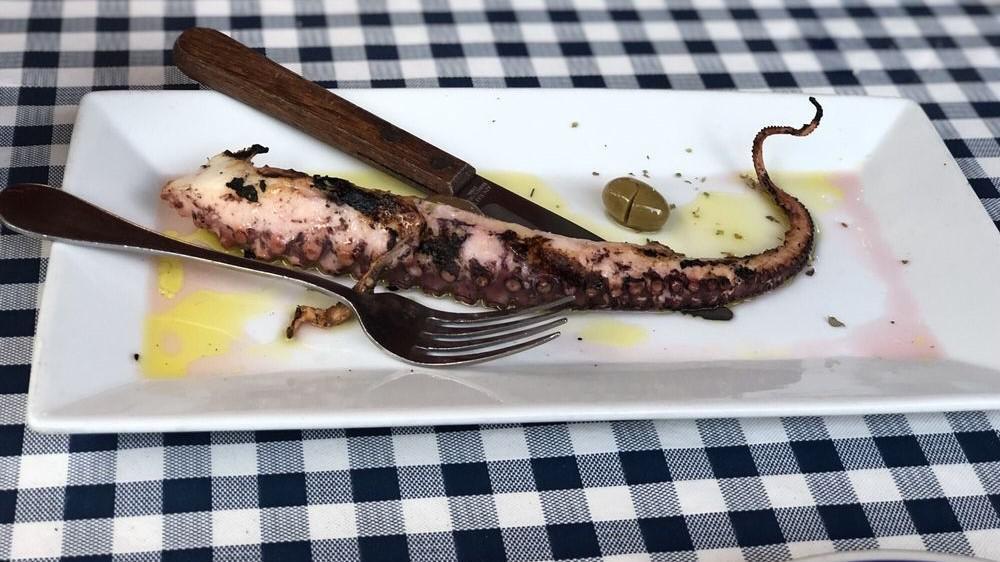 Octopus Sta Karvouna · Mediterranean octopus in olive oil, red vinegar & oregano.