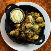 Crispy Brussel Sprouts
 · With goats cheese crumbles and maple aioli.