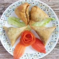 Chicken Samosa · Pastry turnovers stuffed with chicken.