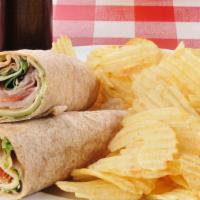 Smoked Turkey Wrap Sandwich · Delicious Wrap made with Smoked turkey, Swiss cheese, alfalfa, apple, and honey mustard.