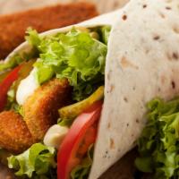 Chicken Cutlet Wrap Sandwich · Delicious Wrap made with Breaded chicken breast, lettuce, tomatoes, and honey mustard.