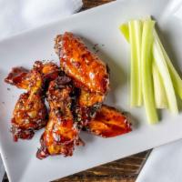 Wings · your choice of sweet whiskey jerk, buffalo, honey bourbon BBQ, or dry rub. served with ranch...