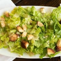 Caesar Salad · Fresh romaine lettuce, crunchy croûtons, Parmesan cheese.