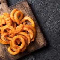 Curly Fries · Curly, golden hand-cut potatoes.