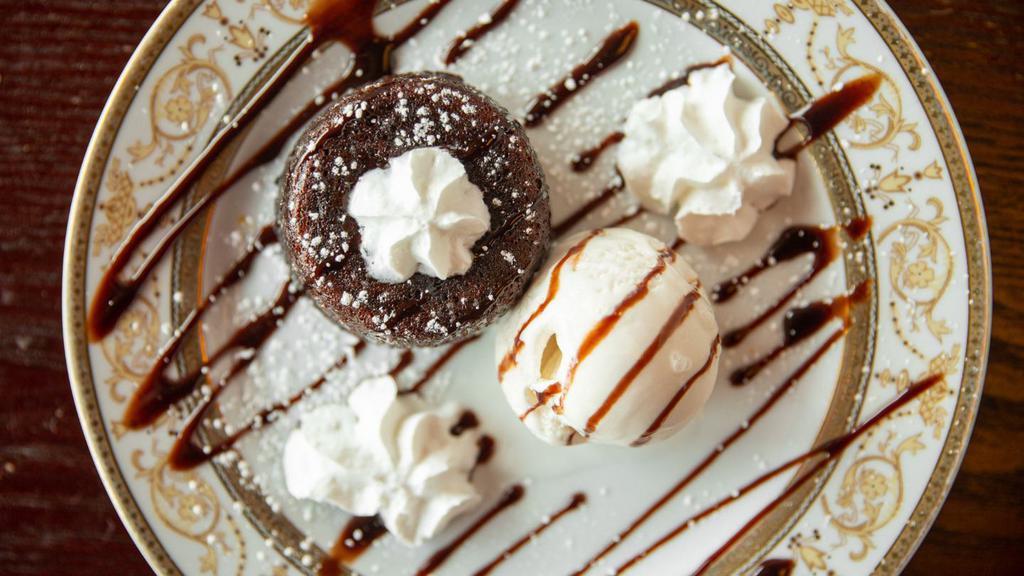 Chocolate Lava Cake · With a scoop of ice cream.