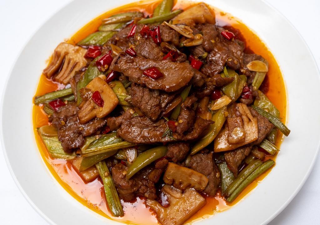 Beef W/ Wild Peppers 野生椒炒牛肉片 · 