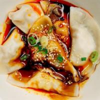 Pork Dumplings In Red Chili Oil · Hot and spicy level 3. Sauce Contains Peanuts.