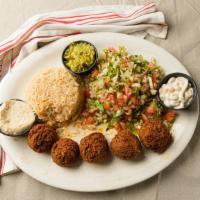 Falafel Platter · Chickpeas patties served with hummus and green salad.