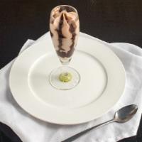 Hazelnut Chocolate Flute · Smooth hazelnut gelato swirled with a rich chocolate sauce presented in an elegant flute glass