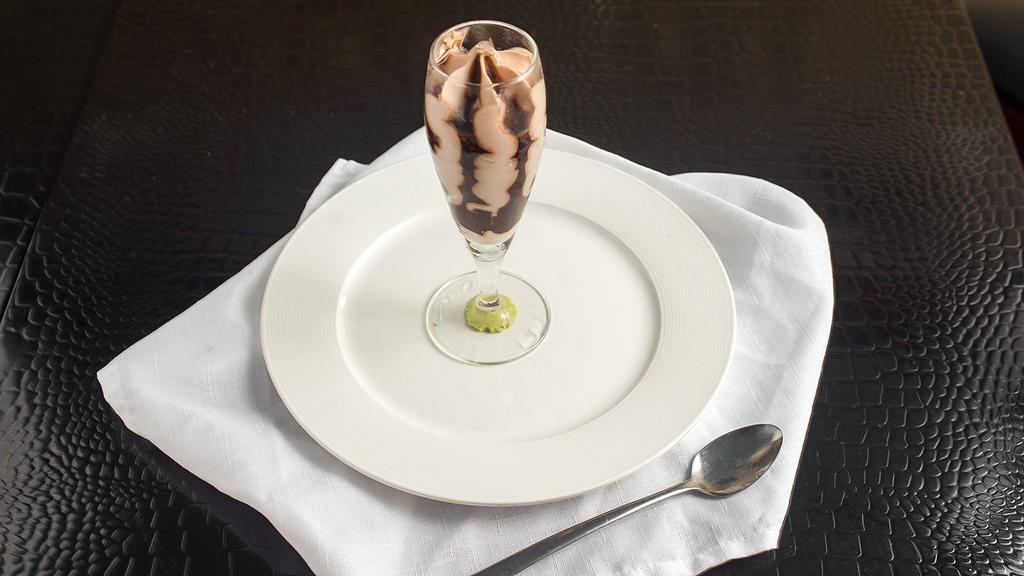 Hazelnut Chocolate Flute · Smooth hazelnut gelato swirled with a rich chocolate sauce presented in an elegant flute glass