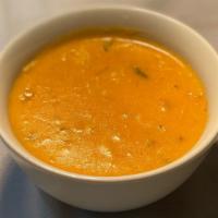 Crab Bisque · Cup of CRAB AND LOBSTER BROTH WITH FRESH LUMP CRAB MEAT GLUTEN FREE.  Gluten free.