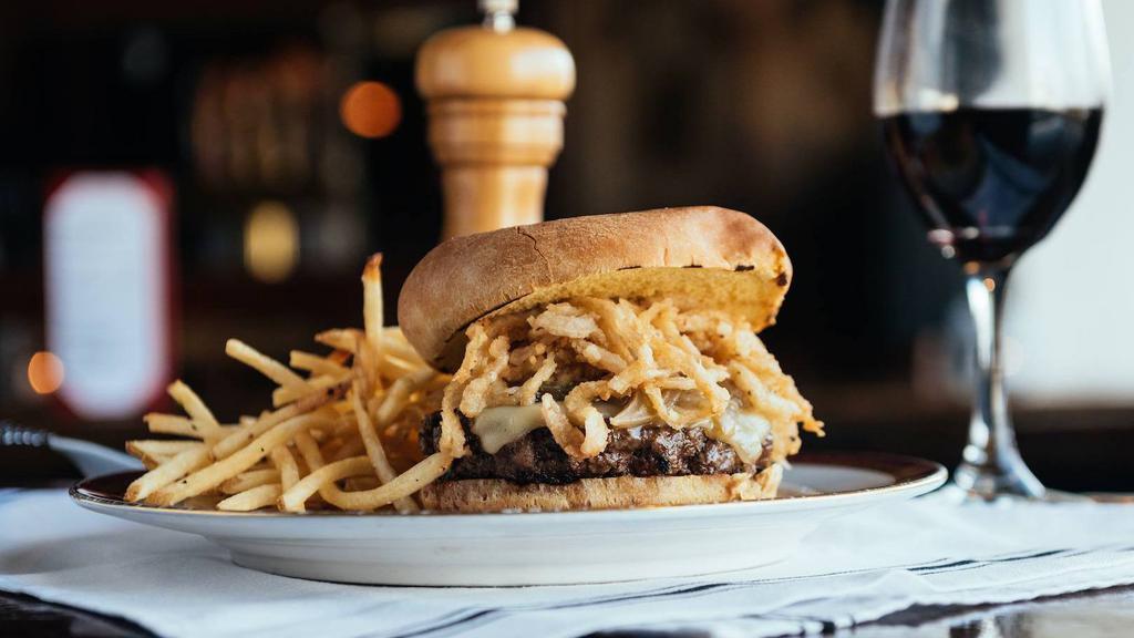 French Onion Burger · Our 10 oz. special blend of ground kobe and brisket topped with gruyere cheese, sauteed onions, crispy onions and served with sea-salt fries.