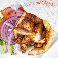 Grilled Chicken Breast Pita · Char-broil chicken breast wrapped in Toasted Pita bread with Lettuce ,tomato, onions and Tza...