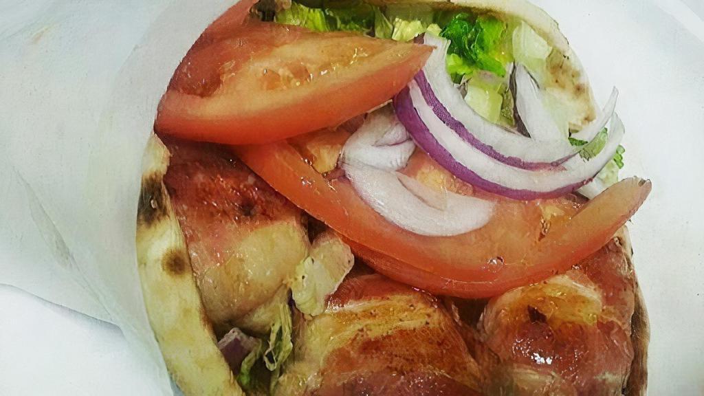 Chicken - Bacon Souviaki Pita · Char-broiled chicken souvlaki cubes and bacon wrapped in Toasted Pita bread with Lettuce ,tomato, onions and Tzatziki sauce.