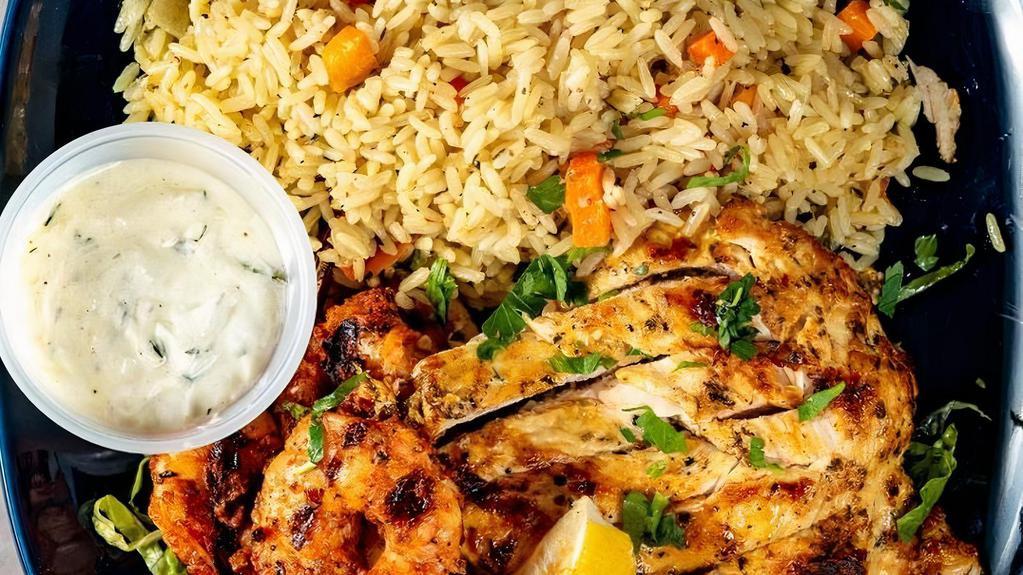 Grilled Chicken Breast Platter · Grilled Chicken Breast Served with Rice or Fries or Lemon Potatoes,Side of Greek Salad, Toasted Pita Bread and Tzatziki Sauce.