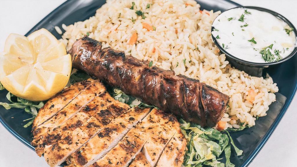 Grilled Chicken Breast & Greek Sausage Combo · Grilled Chicken Breast and Greek Sausage served with Rice or Fries or Lemon Potatoes,Side of Greek Salad, Toasted Pita Bread and Tzatziki Sauce.