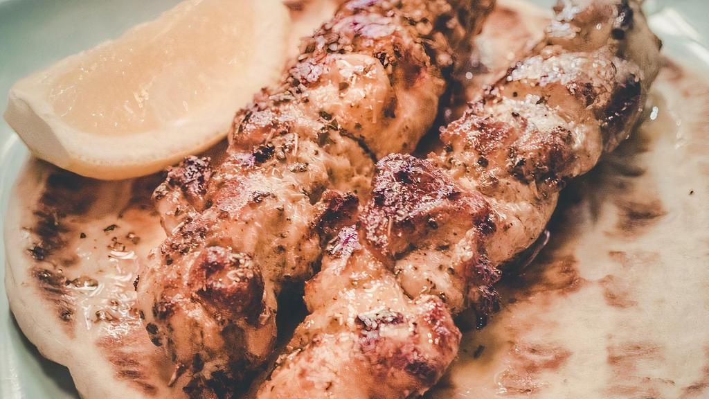 Souviaki Sticks (2) · Char-Broil Chicken or Pork Souvlaki .  Sticks Served over Toasted Pita Bread . Comes with Tzatziki sauce.