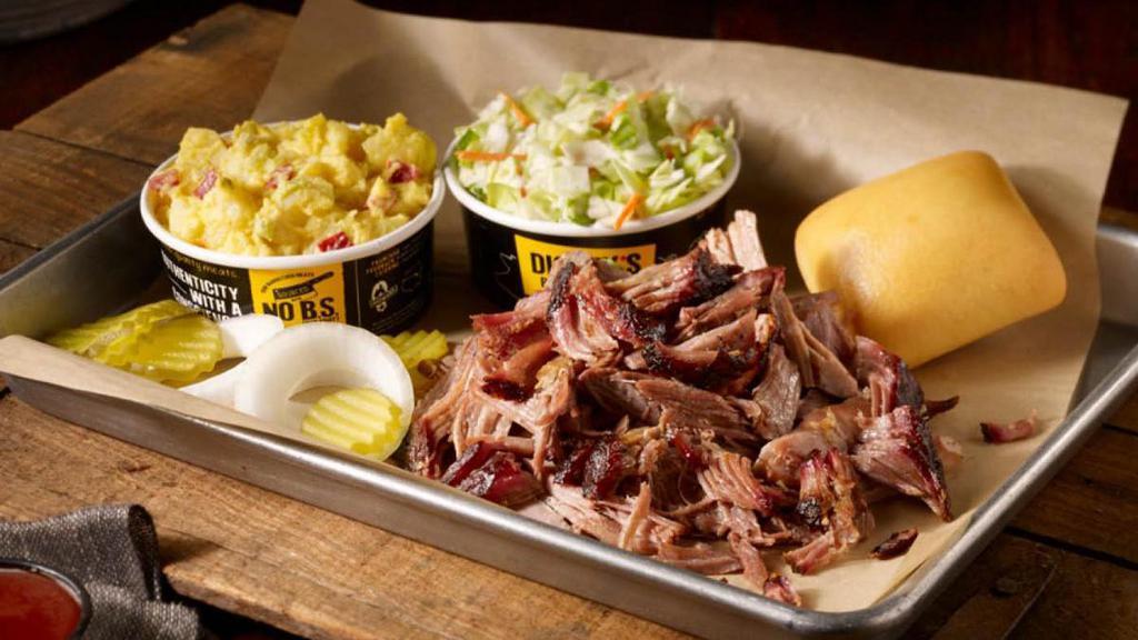 Pulled Pork Plate · Slow-smoked pulled pork dusted with our Dickey's rib rub, served with 2 sides and a roll.