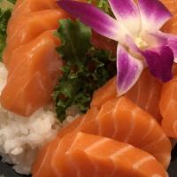 Salmon Don · Sliced salmon and shredded daikon over the sushi rice.