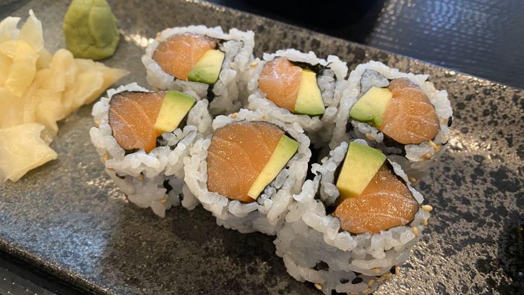 Salmon Avocado Roll · Norway salmon, avocado, wrapped with seaweed and sushi rice. Cut in six pieces.