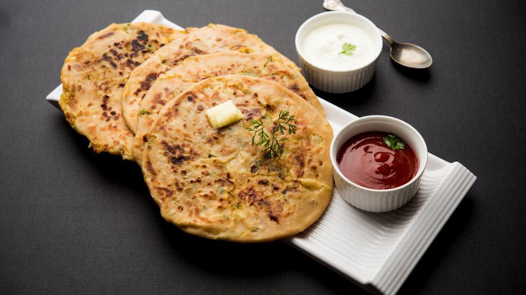 Stuffed Paratha · Buttery, layered, whole wheat flatbread stuffed with your choice of vegetable.