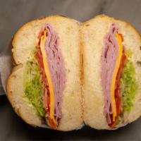 Black Forest Ham Sandwich · Lettuce, tomato, Swiss cheese, mayo and honey mustard.