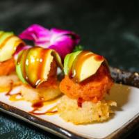 Crispy Rice Cake · Topped with spicy tuna avocado with spicy mayo and eel sauce.