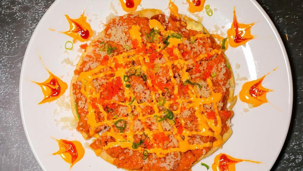 Sushi Pizza · Chopped spicy tuna or spicy salmon avocado masago served on a pancake.