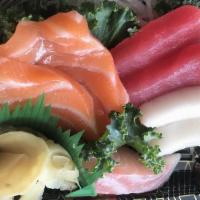 Sashimi Sampler · Chef's choice of seven pieces of sashimi.